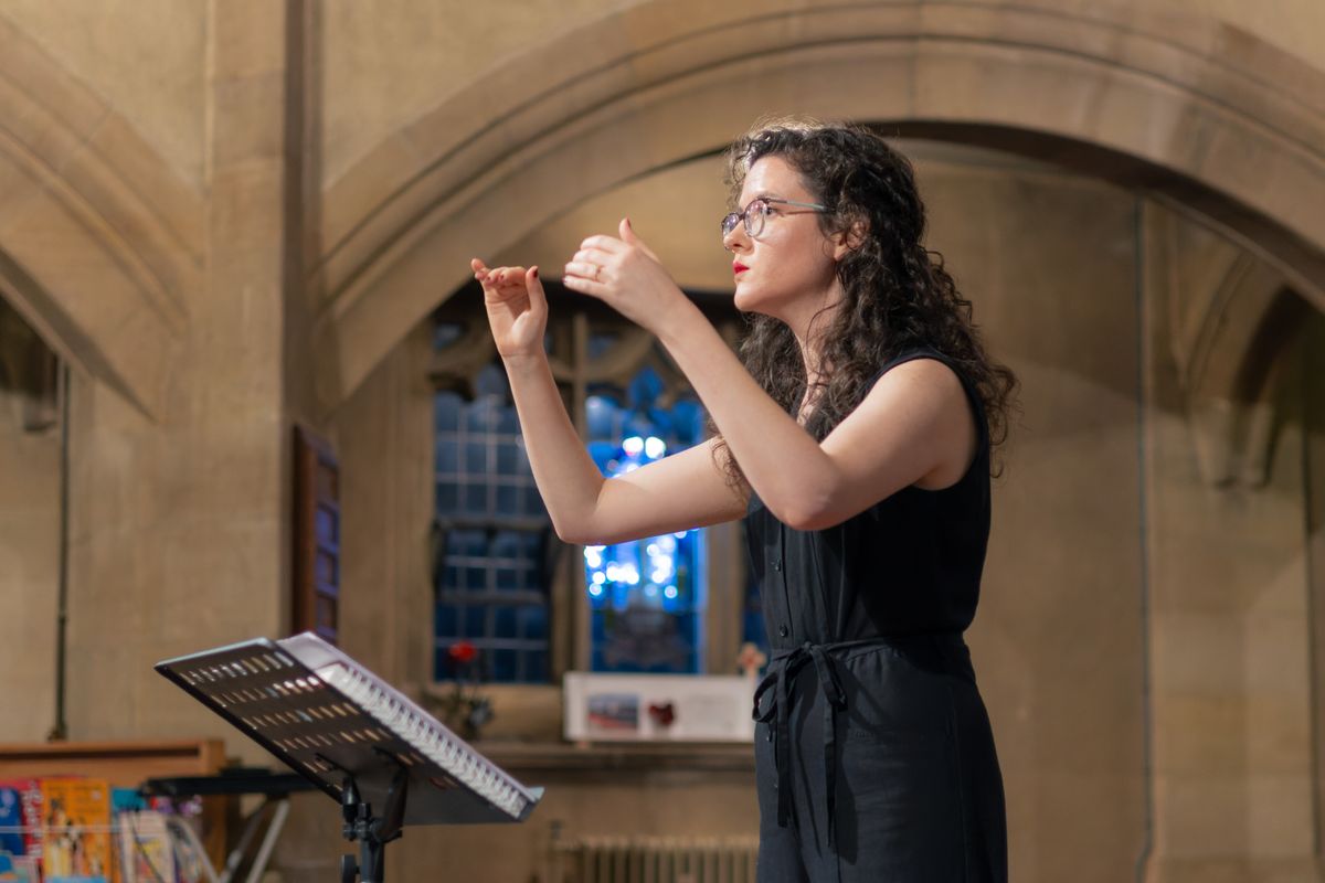 Sierra conducting a rehearsal